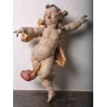 Holzfigur eines kleinen Engels/Putto (20. Jahrhundert), vollplastisch geschnitzt,polychrome Fassung,