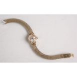 Damenarmbanduhr "Omega" (wohl 1950-60er Jahre), Handaufzug, Gehäuse 750 GG, Band 333 GG,weißes