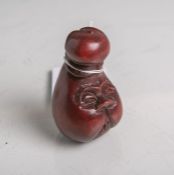 Tropenholz-Netsuke (Provenienz Japan, Alter unbekannt), Kopf mit dicken Wangen und nachoben