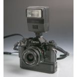 Canon-Fotokamera "A-1" (Japan), Gehäuse-Nr. 426449, Objektiv Canon Lens FD Nr. 1007692,Lens made