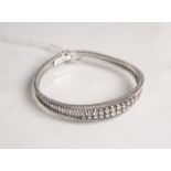 Elegantes Armband 585 WG (1970er Jahre), besetzt m. 22 Brillanten von zus. ca. 1.2 ct,gestempelt: