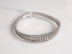 Elegantes Armband 585 WG (1970er Jahre), besetzt m. 22 Brillanten von zus. ca. 1.2 ct,gestempelt: