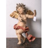 Holzfigur eines kleinen Engels/Putto (20. Jahrhundert), vollplastisch geschnitzt,polychrome Fassung,