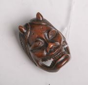 Tropenholz-Netsuke (Provenienz Japan, Alter unbekannt), Maske mit leicht geöffnetem Mund,