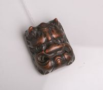 Holz-Netsuke (Provenienz wohl Japan, wohl 19. Jahrhundert), ONI-Maske, wohl sog.Men-Netsuke, wohl