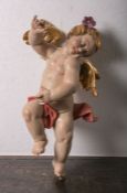 Holzfigur eines kleinen Engels/Putto (20. Jahrhundert), vollplastisch geschnitzt,polychrome Fassung,