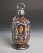 Schraubflasche aus Keramik, brauner Fond m. farbig aufgelegtem Zierrat, im alten Stilausgeführt,