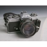 Minolta-Fotokamera "XD7" (Japan), Gehäuse-Nr. 2069937, Objektiv Minolta, MD Rokkor, Nr.2040180, Lens