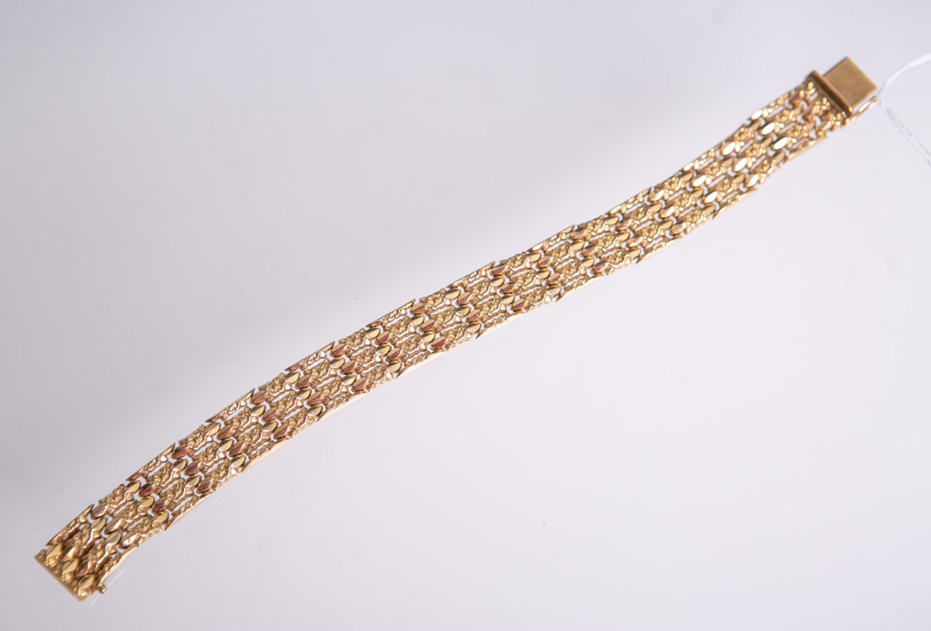 Armband aus 750 GG (1950/60er Jahre, Vincenza, Italien), mit stilisiertem Blütendekor,