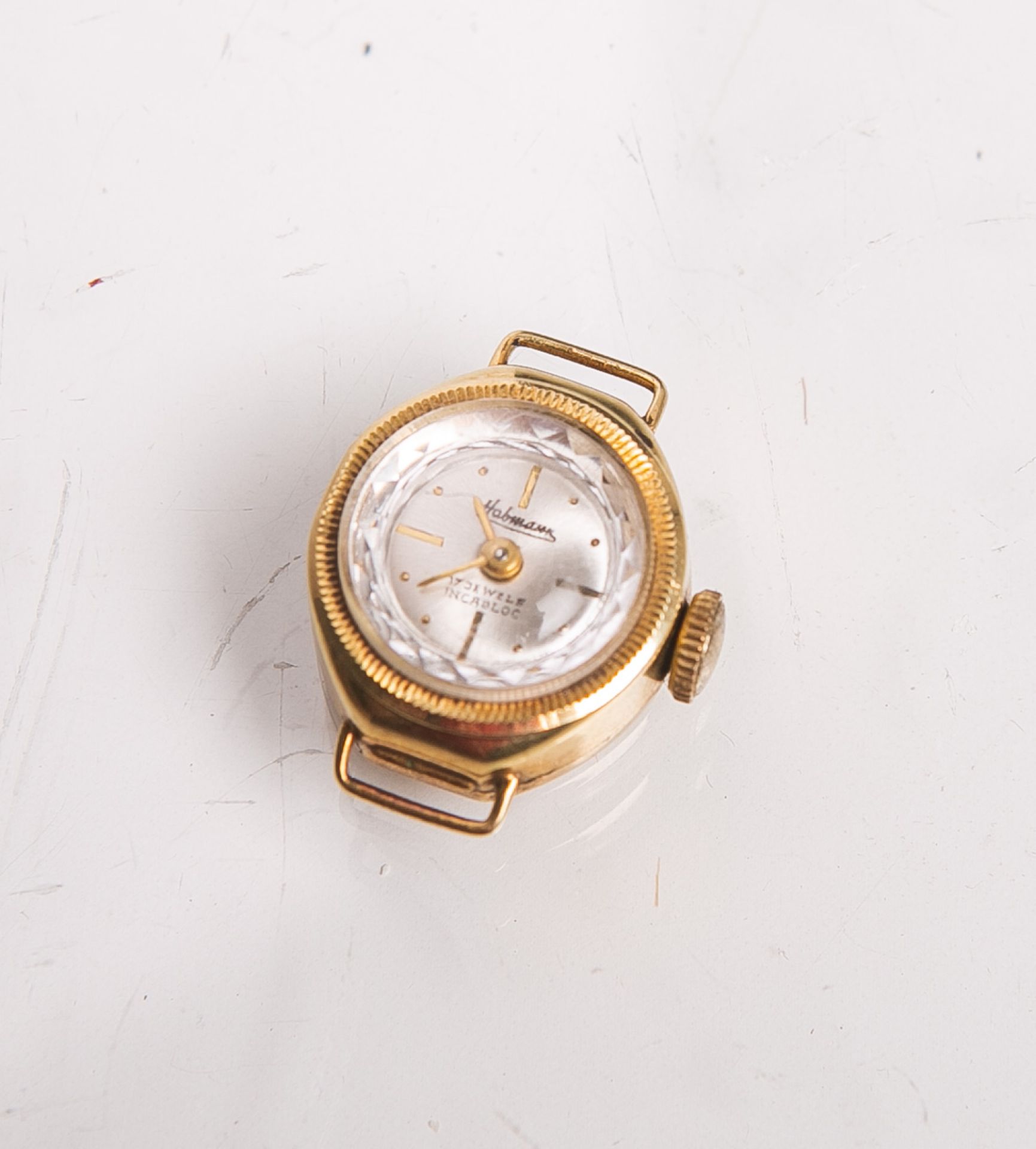 Damenarmbanduhr "Habmann" 585 GG ohne Band, Incablock, weißes Zifferblatt m. goldenen