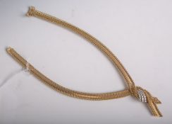 Elegantes Collier in Schleifenform 750 GG (wohl 1950/60er Jahre), besetzt m. 23 Brillanten