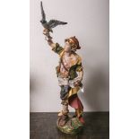 Holzfigur eines Jägers m. Flinte u. Adler auf einem stilisierten Sockel stehend (20.