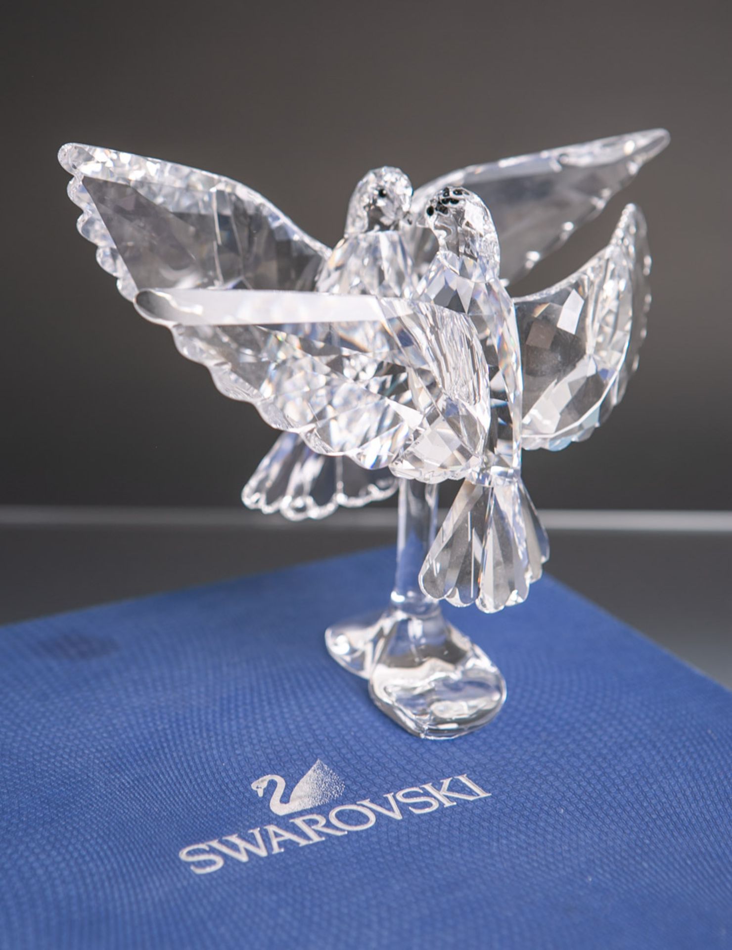Swarovski-Glasvögel, Figurengruppe aus facetiertem Kristallglas, kl. Herstellerplakette,