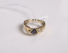 Damenring 750 GG, besetzt m. Amethyst u. 10 kl. Brillanten von zus. ca. 0.20 ct,