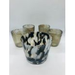 A selection of glassware to include four distressed glass votives and a small contemporary vase