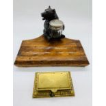 A Black Forest wooden bear desk tidy with glass metal top pot along with a brass desk stamp holder