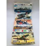 A selection of four kits to include three aircraft and a Japanese Navy Destroyer by Hasegawa