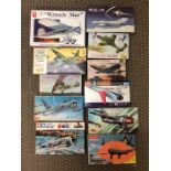 A selection of eleven boxed aircraft kits to include an AMT Winnie Mae and a Mig23 Hoyger by Crown