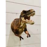 A wall mounted T Rex figure