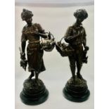 A pair of French spelter figures by George Omerth (1895-1925) titled "Heureuse Fermiere" and "Bon