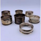 A selection of seven silver napkin rings