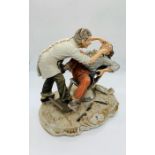 A Rare Capodimonte tableau of Dentist and Patient signed M Lory.
