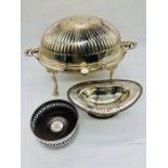 A selection of plated items to include bottle stand, bowl and serving dish
