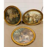 Two oval framed prints and a oval framed watercolour of children with dogs