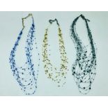 Three delicate multi stranded beaded necklaces