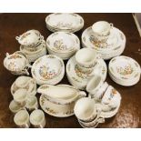 A large quantity of "Cottage Garden" dinner service to include eight dinner plates, eight side