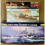 A selection of three boxed battleships to include a Heller HMS King George V Cuirasses, a German "
