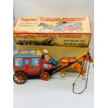 Cragstan (Japan) Overland Stagecoach: tinplate battery operated stagecoach is maroon with spoked