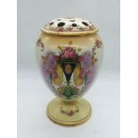 A porcelain flower centrepiece vase