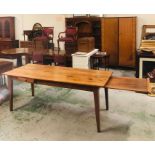 A cherrywood farm table with serving slide and side drawer Circa 1840.
