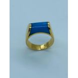 A Persian gold and turquoise ring (total weight 9.83g)