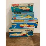 Four boxed Sutcliffe clockwork speedboats, Jupiter, Tiger, Commodore and Merlin