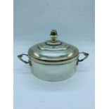 A continental silver two handled glass lined and lidded dish.