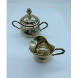 A small continental silver sugar bowl and milk jug.