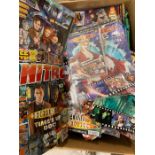 A large selection of Doctor Who Adventures magazines, some with gifts in original packaging
