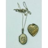 A small silver oval locket on chain and a 9ct gold on silver heart locket