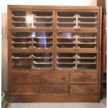 A large Haberdashers unit with six lower drawers and six upper compartments with pull out drawers