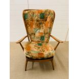 An Ercol high back Windsor easy armchair