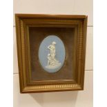 A framed Wedgwood Jasperware plaque.