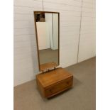 A Mid Century model Ercol freestanding cheval mirror London