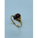 9 ct yellow gold, tourmaline and sapphire ring. Ring Size N 1/2