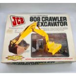 A JCB 808 Crawler Excavator 1/32, boxed kit by Davric 1979