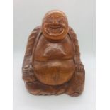 A carved wooden Buddha