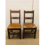 A pair of niave oak chairs