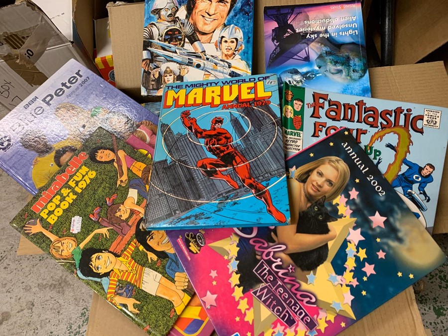 A large selection of annuals to include, Action Man, Magpie, Superman, Wombles, etc