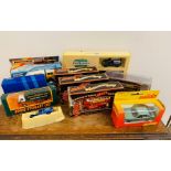 A selection of diecast promotional model cars, buses and lorries